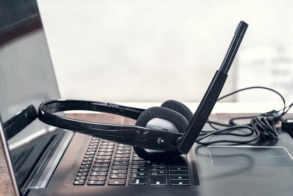 ringcentral residential voip service headset on laptop